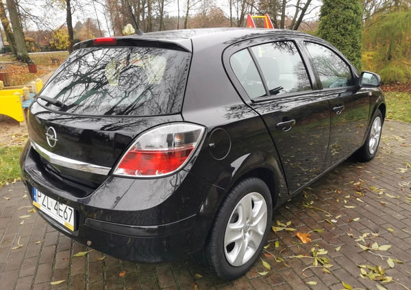 Opel Astra cena 17500 przebieg: 243080, rok produkcji 2011 z Ostróda małe 704